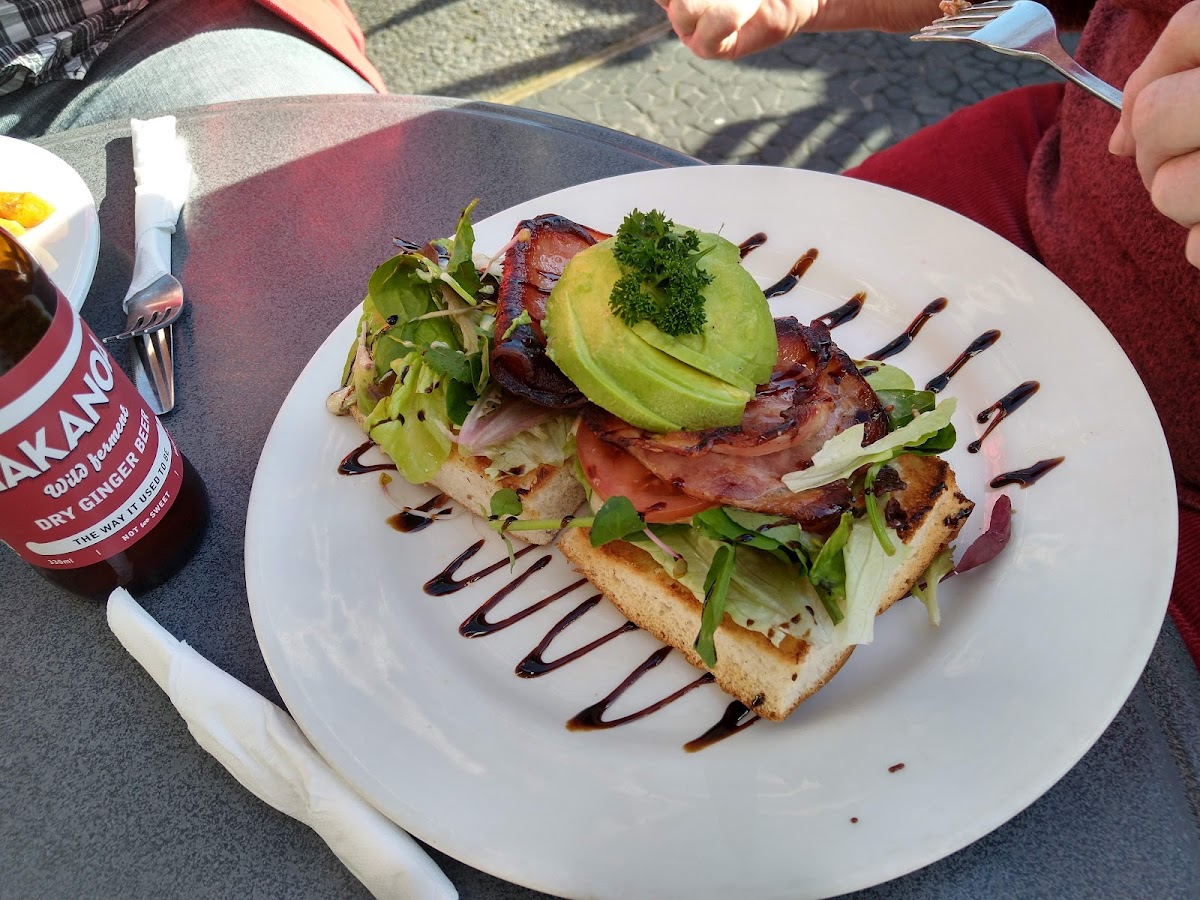 Bacon, avocado and tomato stack on toasted sourdough